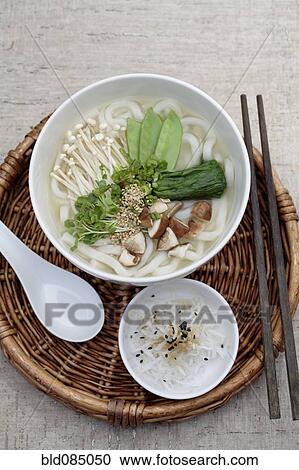 Stock Image - Vegetarian udon noodle soup. Fotosearch