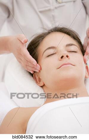 Woman having facial massage View Large Photo Image Stock Image - Woman having facial massage. Fotosearch