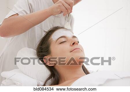 Woman having facial spa treatment View Large Photo Image Picture - Woman having facial spa treatment. Fotosearch