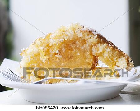 Stock Image - Close up of rustic custard dessert. Fotosearch