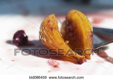 Stock Photo - Close up of sliced fig. Fotosearch