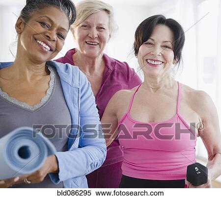 Friends in exercise class View Large Photo Image Stock Photography - Friends in exercise class. Fotosearch
