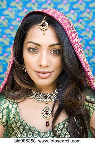 Stock Photo - Indian woman in glamorous traditional clothing. Fotosearch