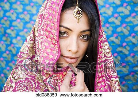 Indian woman in glamorous traditional clothing View Large Photo Image Stock Photo - Indian woman in glamorous traditional clothing. Fotosearch