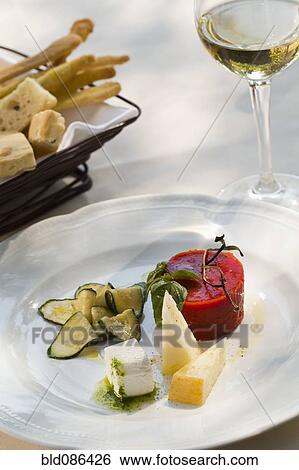 Italian cheese plate with tomato aspic View Large Photo Image Stock Photograph - Italian cheese plate with tomato aspic. Fotosearch