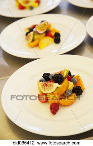 Stock Image - Plate of appetizing fruit salad. Fotosearch