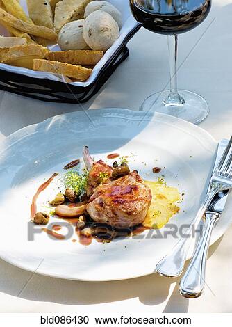 Red wine and Italian lamb chop View Large Photo Image Stock Image - Red wine and Italian lamb chop. Fotosearch