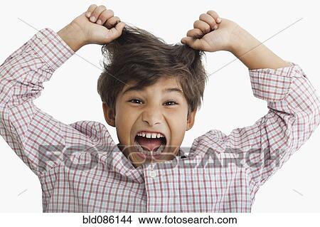 Picture - Screaming Hispanic boy. Fotosearch