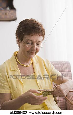 Senior Chilean woman knitting View Large Photo Image Stock Image - Senior Chilean woman knitting. Fotosearch