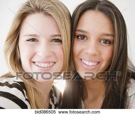 Stock Photography - Smiling teenage girls. Fotosearch