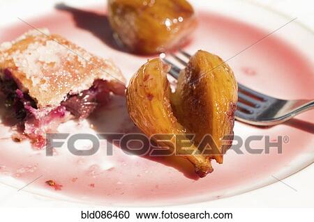 Stock Image - Tart and sliced fig. Fotosearch