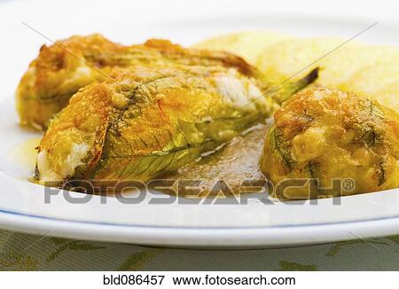 Traditional stuffed Italian zucchini flowers View Large Photo Image Stock Photo - Traditional stuffed Italian zucchini flowers. Fotosearch