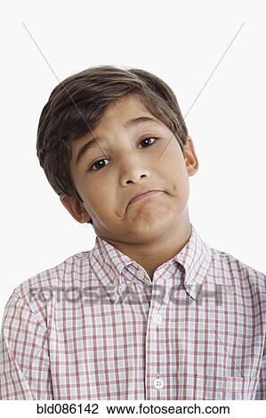 Uncertain Hispanic boy View Large Photo Image Stock Image - Uncertain Hispanic boy. Fotosearch