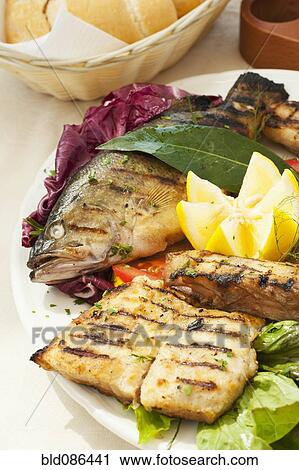 Stock Image - Various grilled trout. Fotosearch