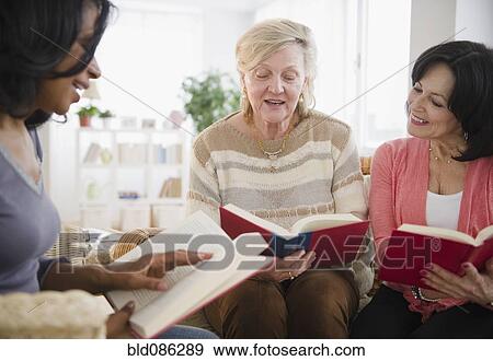 Women enjoying book club meeting View Large Photo Image Stock Photo - Women enjoying book club meeting. Fotosearch