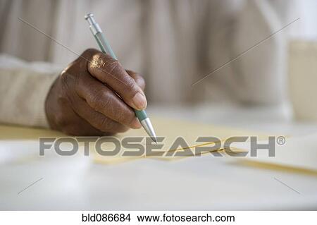 Picture - Black woman writing letter. Fotosearch