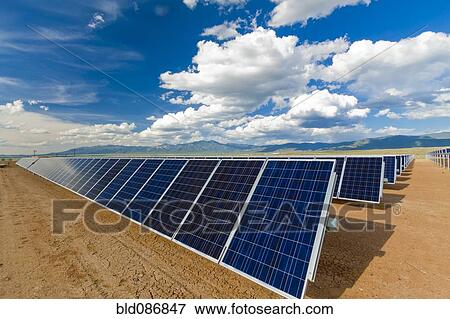Blue sky over solar panels View Large Photo Image Stock Photo - Blue sky over solar panels. Fotosearch