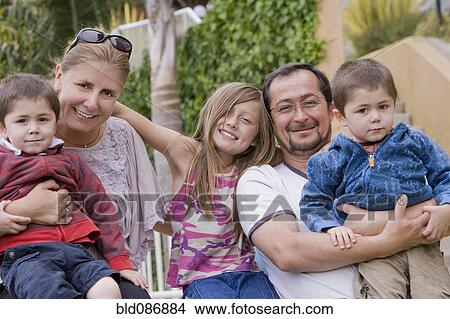 Chilean family posing outdoors View Large Photo Image Picture - Chilean family posing outdoors. Fotosearch