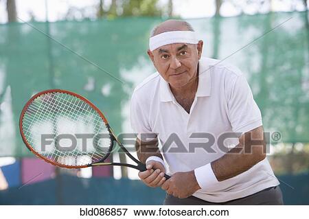 Chilean man playing tennis View Large Photo Image Stock Photo - Chilean man playing tennis. Fotosearch