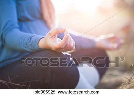 Pregnant mixed race woman practicing yoga in field View Large Photo Image Stock Photography - Pregnant mixed race woman practicing yoga in field. Fotosearch