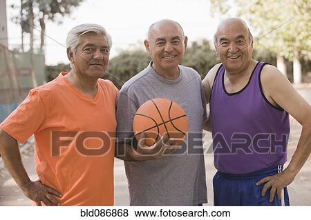 Senior Chilean men playing basketball together View Large Photo Image Stock Photo - Senior Chilean men playing basketball together. Fotosearch