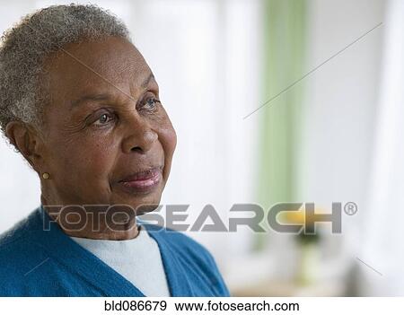 Stock Photo - Serious Black woman. Fotosearch