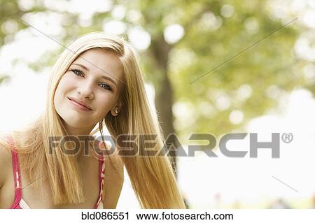 Smiling Caucasian teenage girl View Large Photo Image Stock Image - Smiling Caucasian teenage girl. Fotosearch