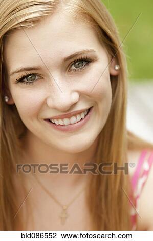 Smiling Caucasian teenage girl View Large Photo Image Stock Image - Smiling Caucasian teenage girl. Fotosearch