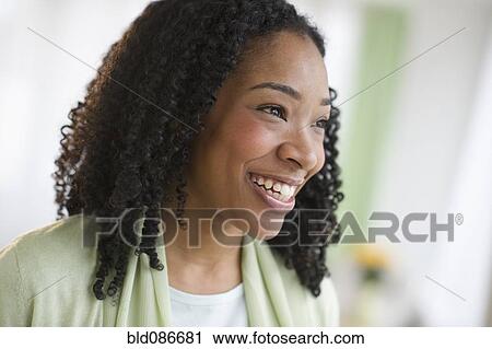 Smiling mixed race woman View Large Photo Image Stock Image - Smiling mixed race woman. Fotosearch