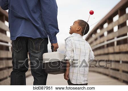 Father and son going fishing together View Large Photo Image Stock Image - Father and son going fishing together. Fotosearch