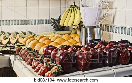 Fruits and blender in kitchen counter View Large Photo Image Picture - Fruits and blender in kitchen counter. Fotosearch