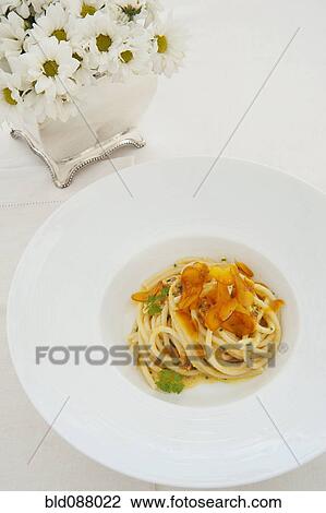 Pasta with caramelized garlic View Large Photo Image Stock Image - Pasta with caramelized garlic. Fotosearch