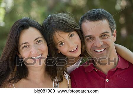 Stock Image - Smiling Hispanic family. Fotosearch