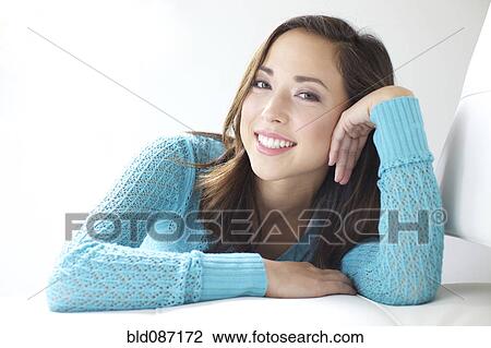 Smiling mixed race woman View Large Photo Image Stock Image - Smiling mixed race woman. Fotosearch
