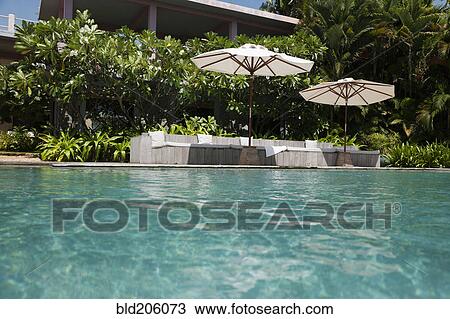 Stock Image - A view of the infinity swimming pool. Fotosearch