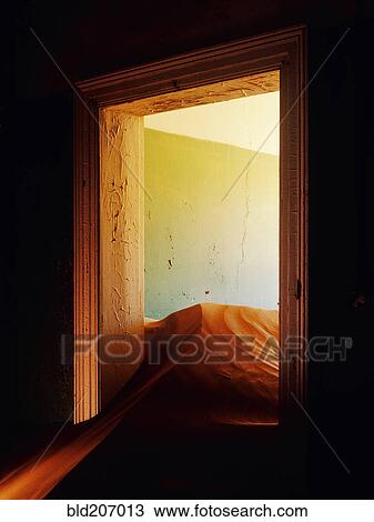 Stock Image - Abandoned House Filled with Drifting Sand. Fotosearch
