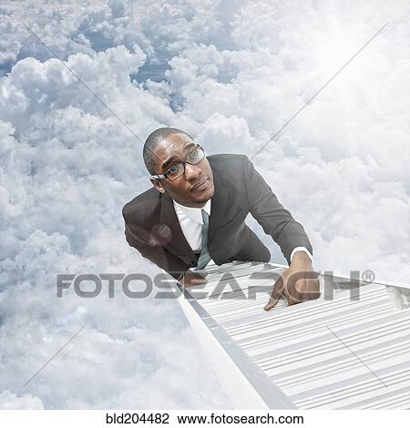 African American businessman climbing ladder View Large Photo Image Stock Image - African American businessman climbing ladder. Fotosearch