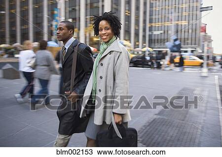 African American businesspeople on urban sidewalk View Large Photo Image Stock Image - African American businesspeople on urban sidewalk. Fotosearch