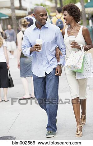 African American couple with shopping bags View Large Photo Image Stock Photograph - African American couple with shopping bags. Fotosearch