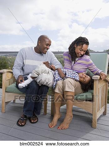 African American family playing on deck View Large Photo Image Picture - African American family playing on deck. Fotosearch