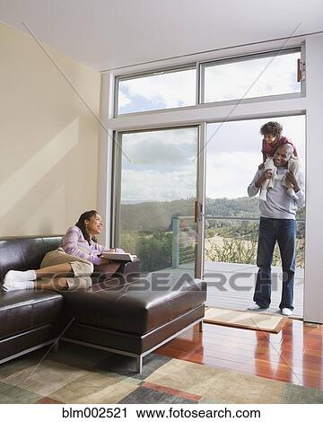 African American family relaxing at home View Large Photo Image Stock Image - African American family relaxing at home. Fotosearch
