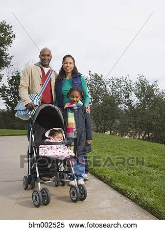African American family with stroller View Large Photo Image Stock Photography - African American family with stroller. Fotosearch