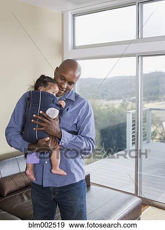African American father holding baby View Large Photo Image Stock Photo - African American father holding baby. Fotosearch