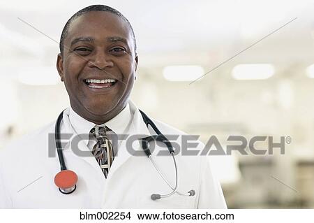 African American male doctor laughing View Large Photo Image Picture - African American male doctor laughing. Fotosearch