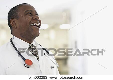 African American male doctor laughing View Large Photo Image Stock Image - African American male doctor laughing. Fotosearch