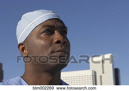 Stock Photo - African American male doctor outdoors. Fotosearch