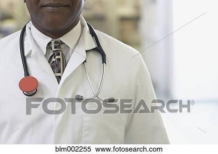 Stock Photography - African American male doctor with stethoscope. Fotosearch