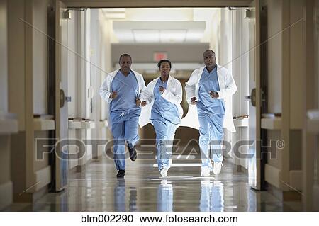 African American medical professionals running in hallway View Large Photo Image Stock Image - African American medical professionals running in hallway. Fotosearch