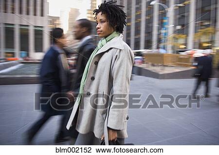 African American woman on urban sidewalk View Large Photo Image Stock Image - African American woman on urban sidewalk. Fotosearch