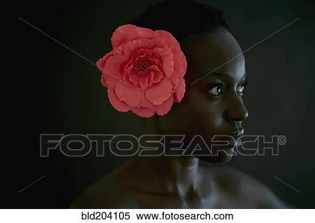 African American woman wearing flower in hair View Large Photo Image Stock Photography - African American woman wearing flower in hair. Fotosearch